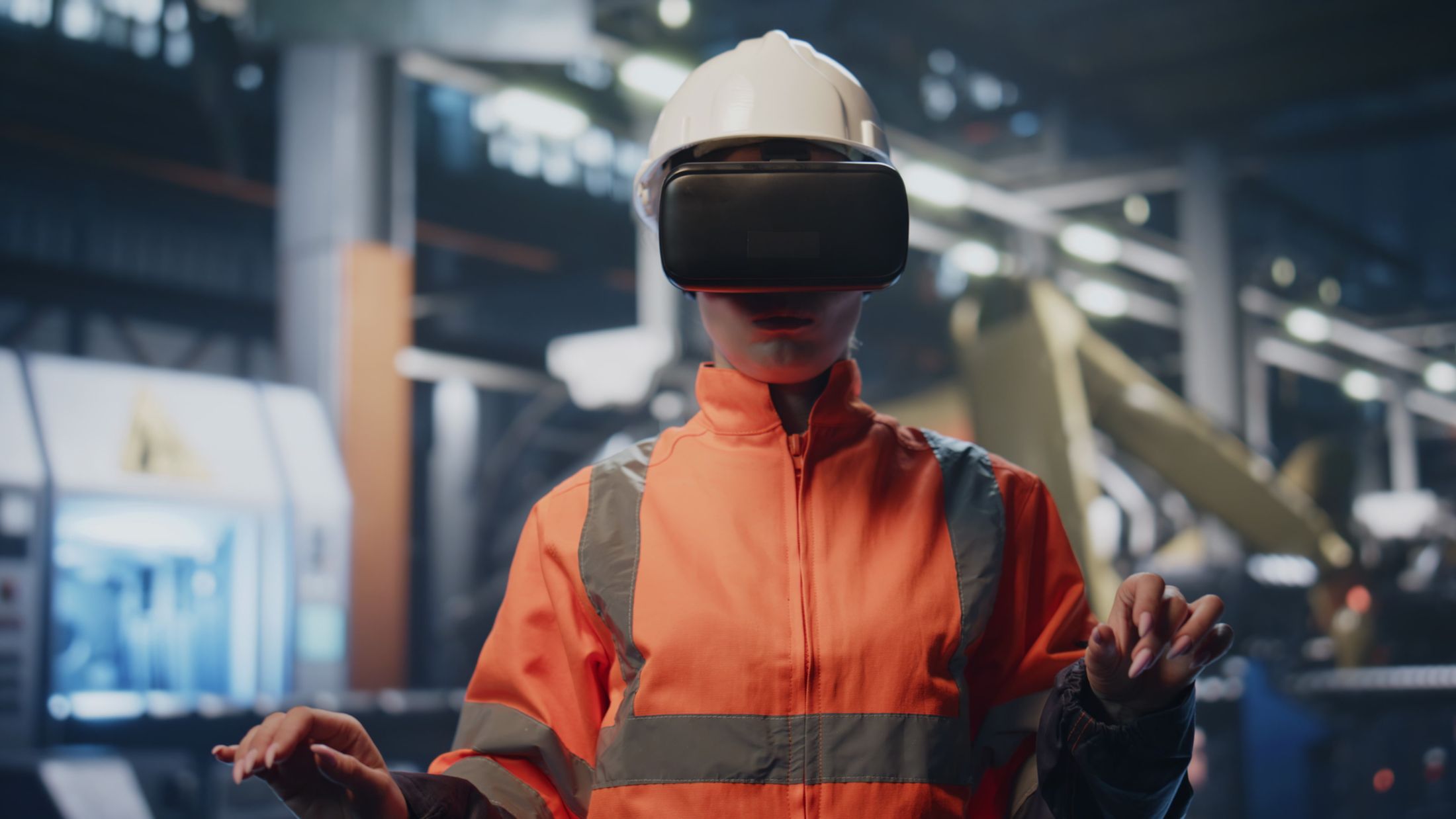 Learner in a VR headset inside a simulated factory